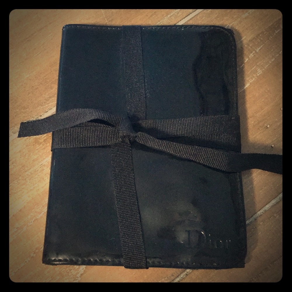 Dior cosmetic travel bag.